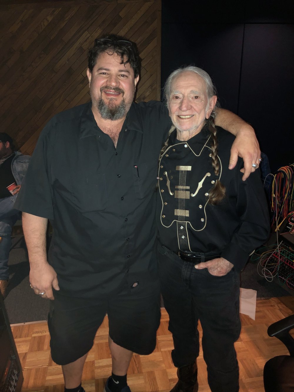  With Willie Nelson at Rolling Stone Magazine’s '“Weed” issue photo shoot. 